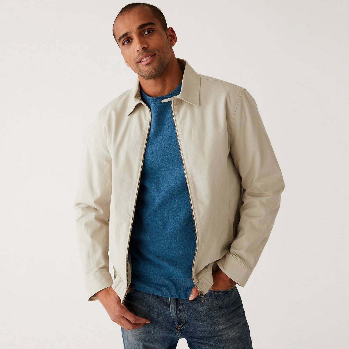 Model wearing beige Harrington. Shop coats & jackets